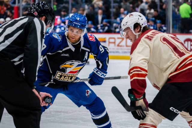 TJ Tynan awaits a faceoff against Tucson.