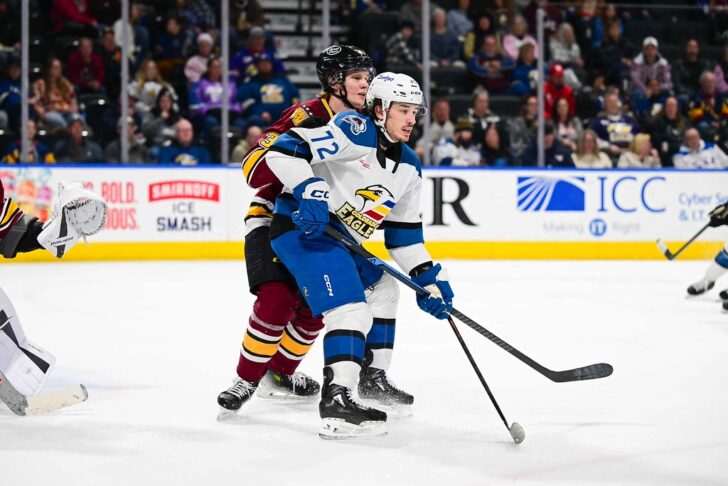 Barré-Boulet battles for the puck against the Chicago Wolves in February 2026.